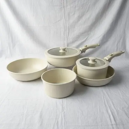 The Rose Quartz 5-Piece Light Forged Cookware Set with Detachable Cream Handle