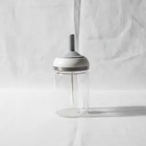 The Amber Flow Premium Glass Honey Jar with Integrated Lid & Spoon