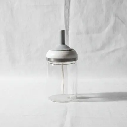The Amber Flow Premium Glass Honey Jar with Integrated Lid & Spoon
