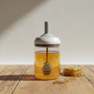 The Amber Flawless Glass Honey Jar with Honeycomb Lid